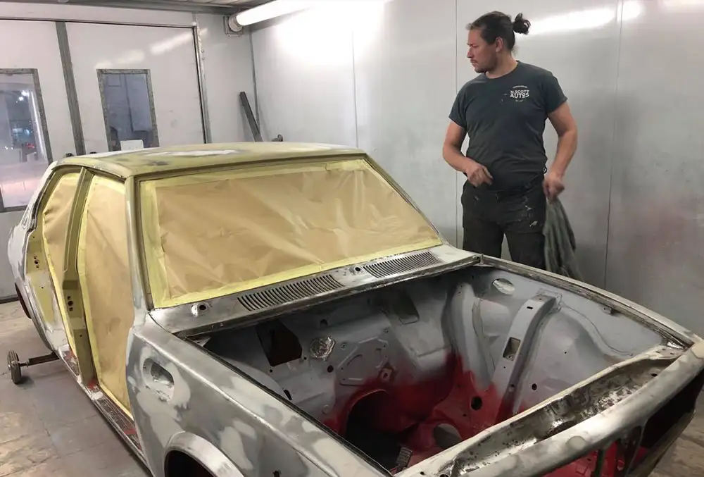 n_scott_12 Man working on respray of vehicle